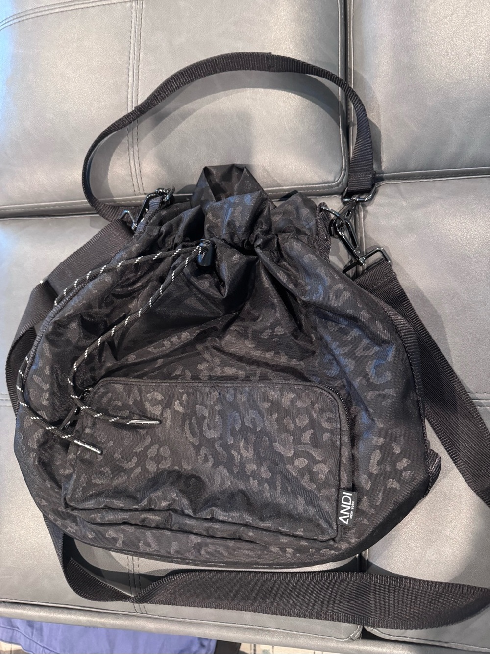 ANDI Black Leopard-Print Drawstring Crossbody Bag